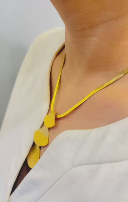 Geometric pendant necklaces